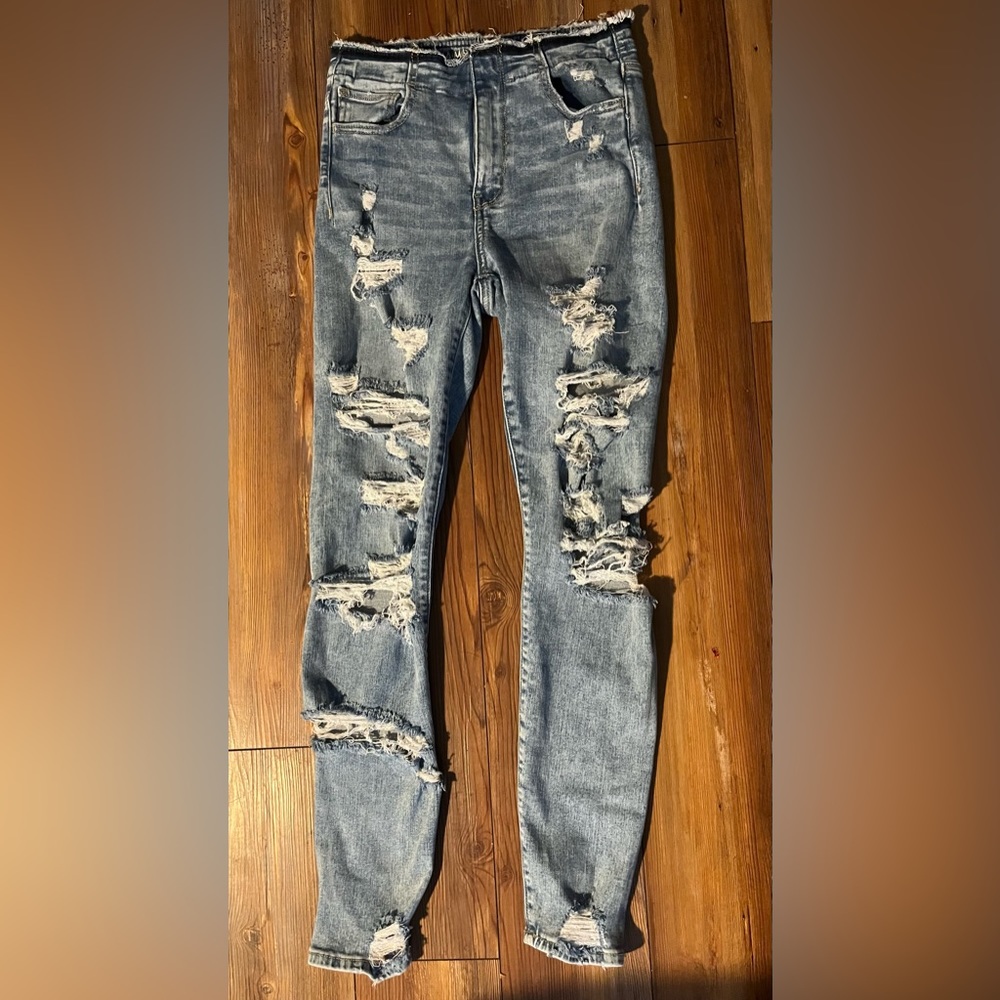 American Eagle Women size 4 DISTRESSED, next level stretch high rise jeans